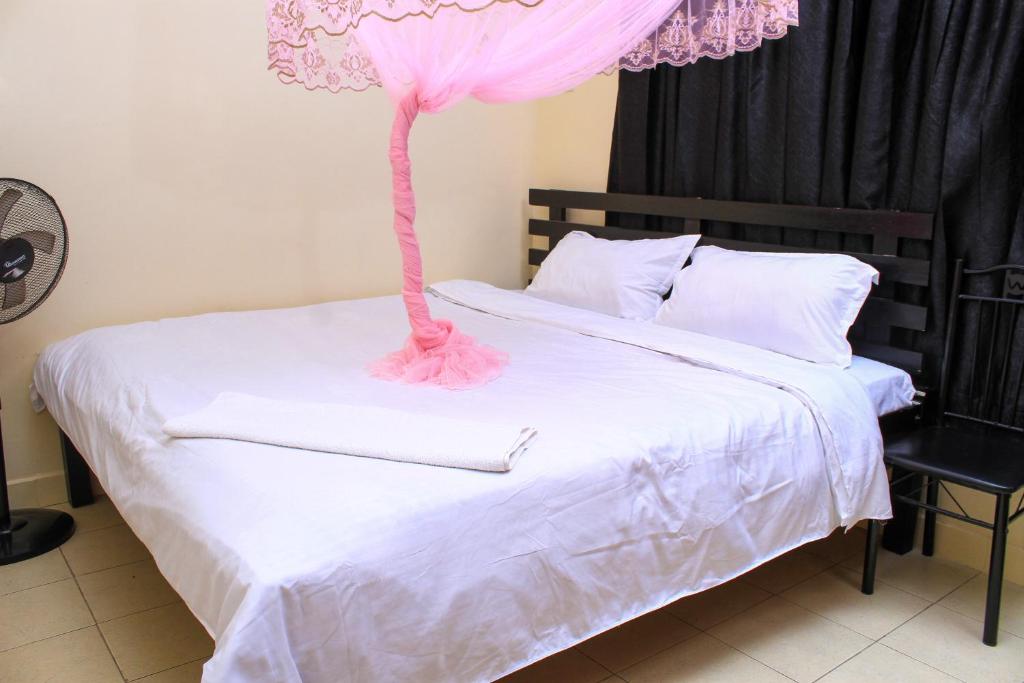 Vuode tai vuoteita majoituspaikassa MILANY HOMES - near JKIA airport and SGR train station