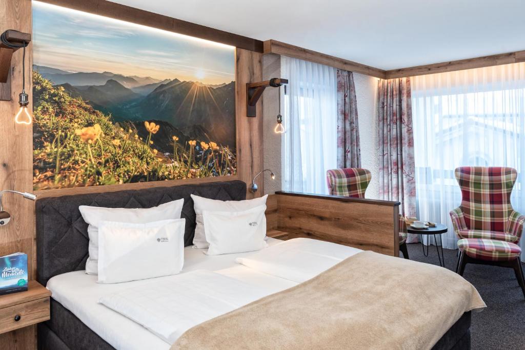 Cama ou camas em um quarto em Hotel Tyrol