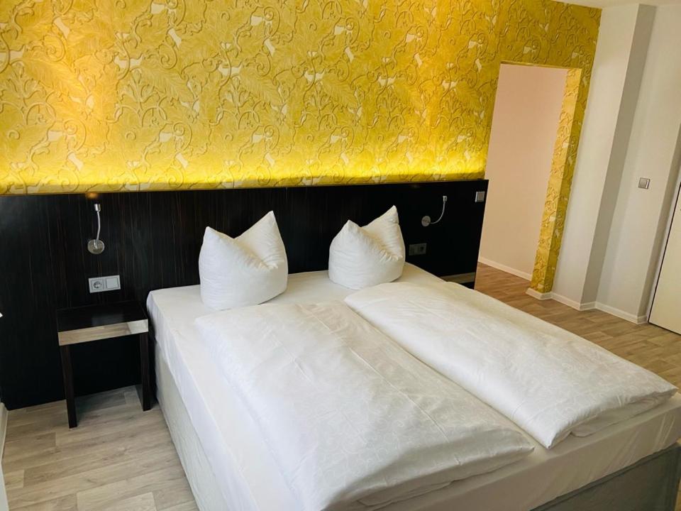 Giường trong phòng chung tại Hotel 22