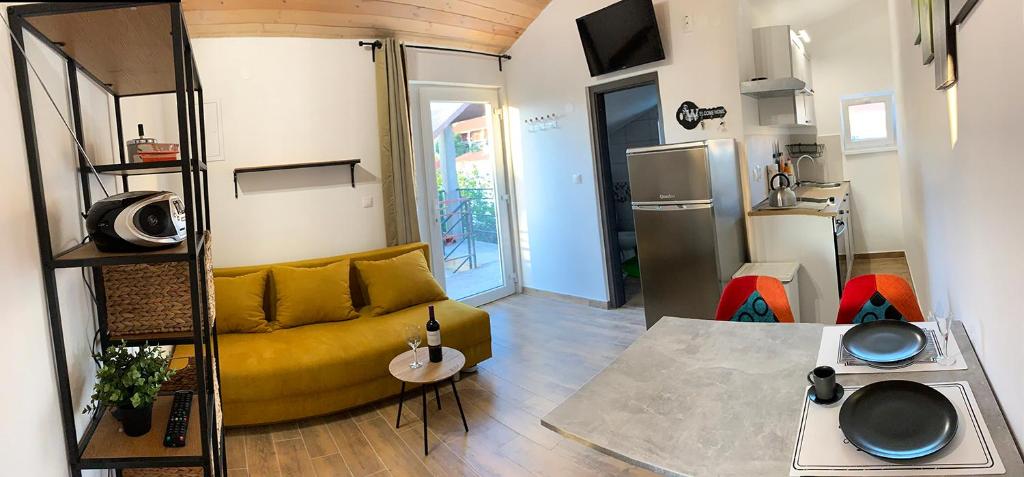 Kuchyň nebo kuchyňský kout v ubytování Apartmany Rogoznica