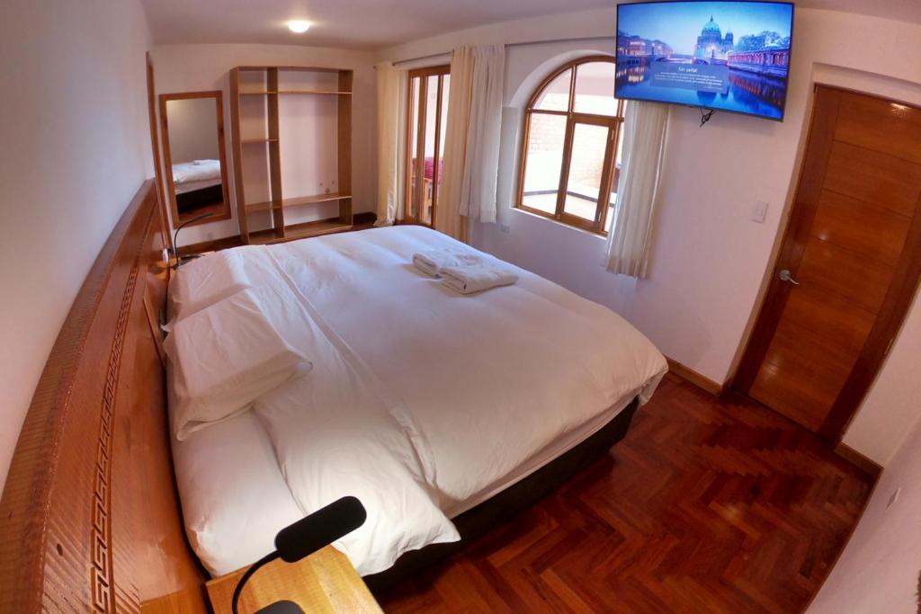 Una cama o camas en una habitación de Akilpo Home