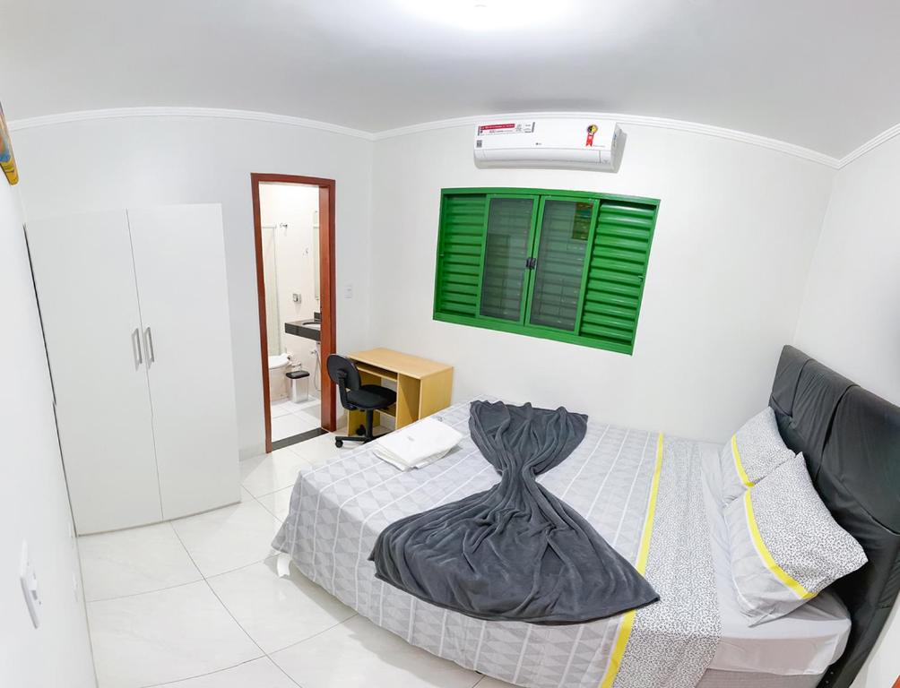 Llit o llits en una habitació de Otimo apto com lazer e Wi-Fi em Campo Grande MS