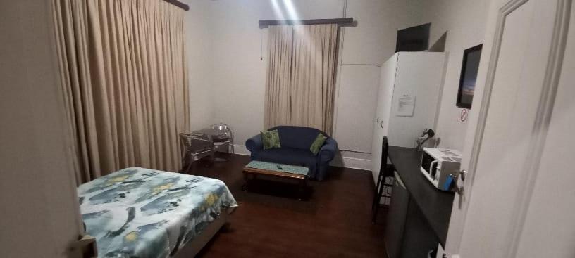 Tempat tidur dalam kamar di Glen Lilly Self Catering