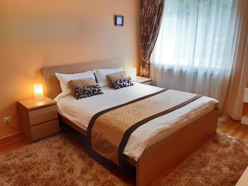 Ліжко або ліжка в номері Apartament Central