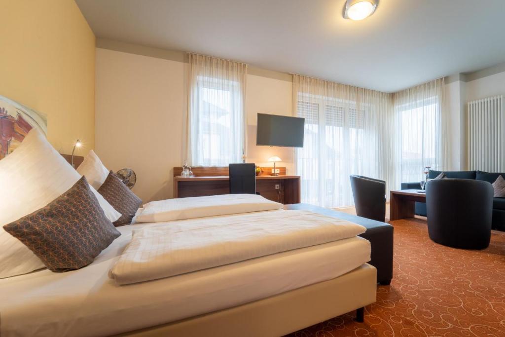 TV a/nebo společenská místnost v ubytování Hotel St Georg - Regensburg