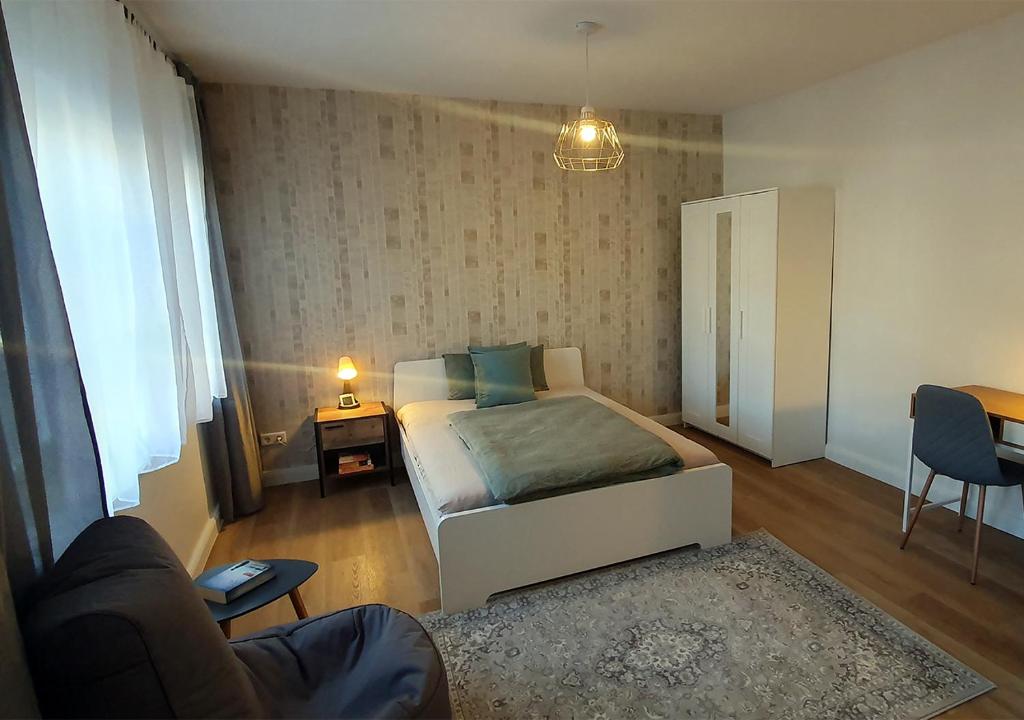 Postel nebo postele na pokoji v ubytování Elegante Einzimmerwohnung