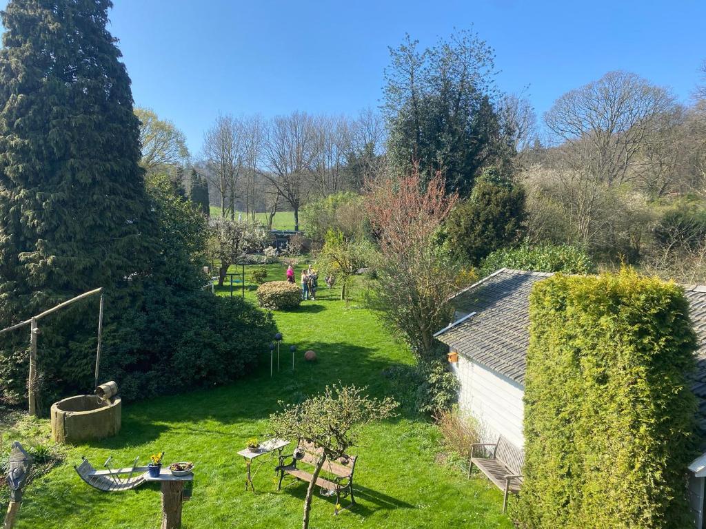 Un jardín fuera de Natuurhuisje Heerlijkheid Beek