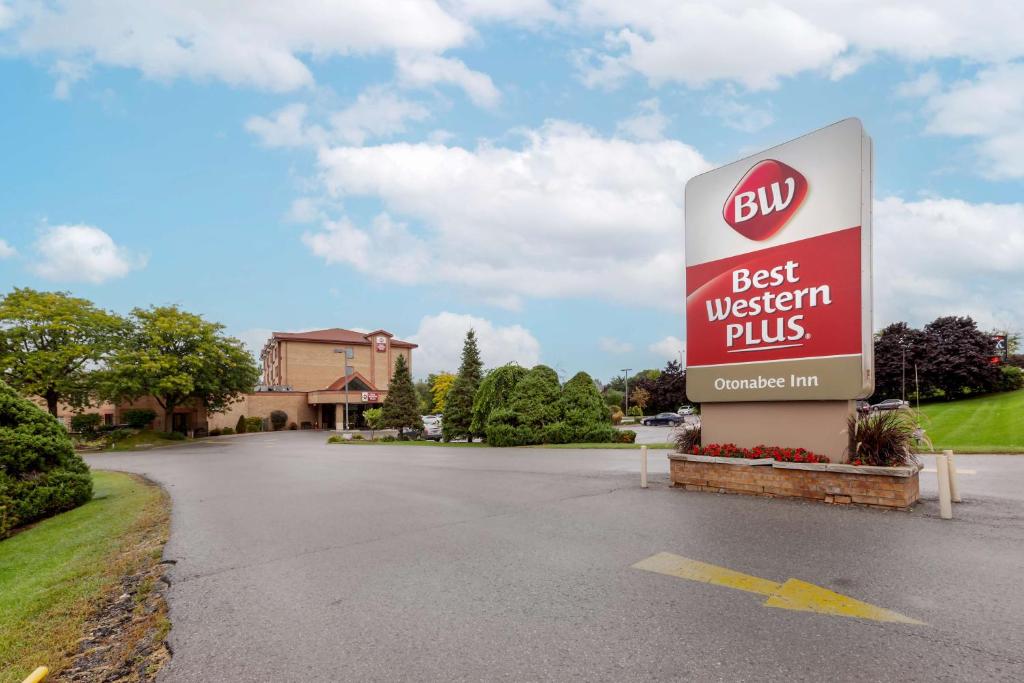 a sign for a best western plus in a driveway at Best Western Plus Otonabee Inn in Peterborough