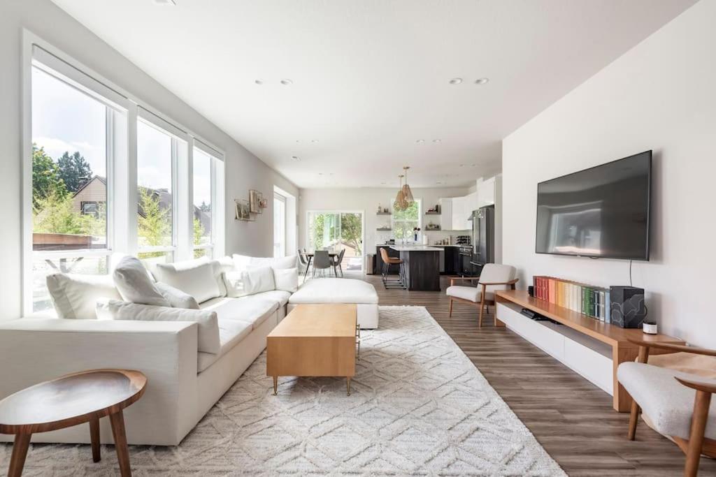 A seating area at Comfy Family Home, Walkable Neighborhood + Patio!