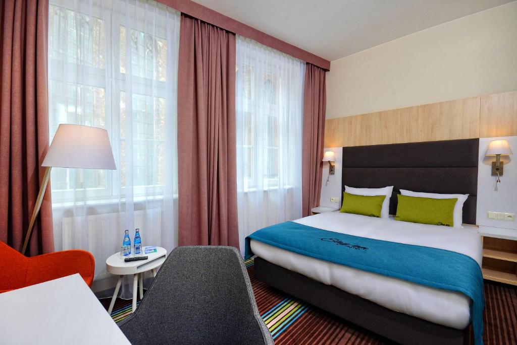 Ліжко або ліжка в номері Stay inn Hotel Gdańsk