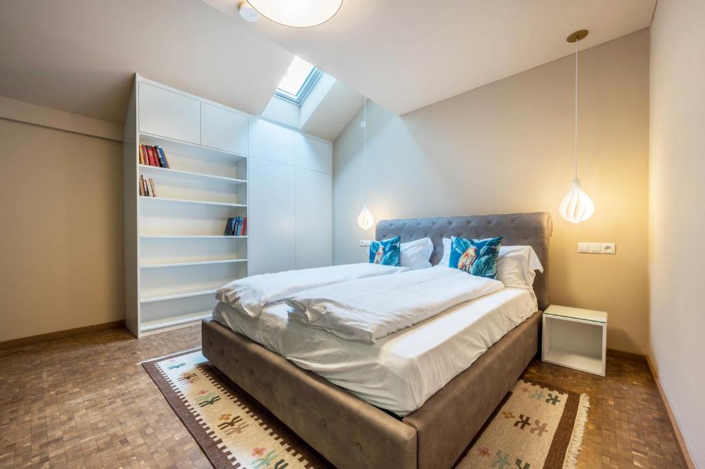 Una cama o camas en una habitación de Loft Lauben