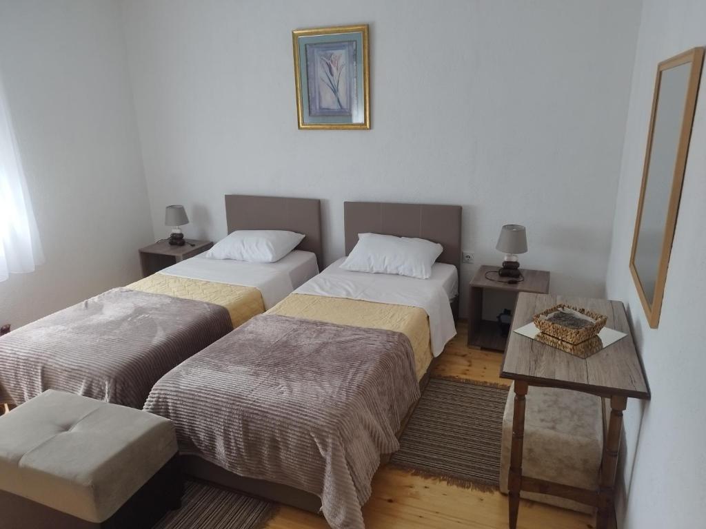 Apartment Serenity tesisinde bir odada yatak veya yataklar