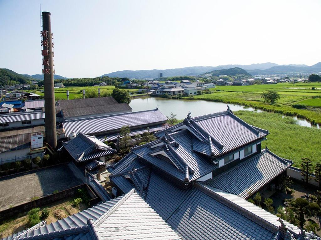 an overhead view of a village with a river and buildings at Kungin Bettei - Vacation STAY 14605 in Himeji