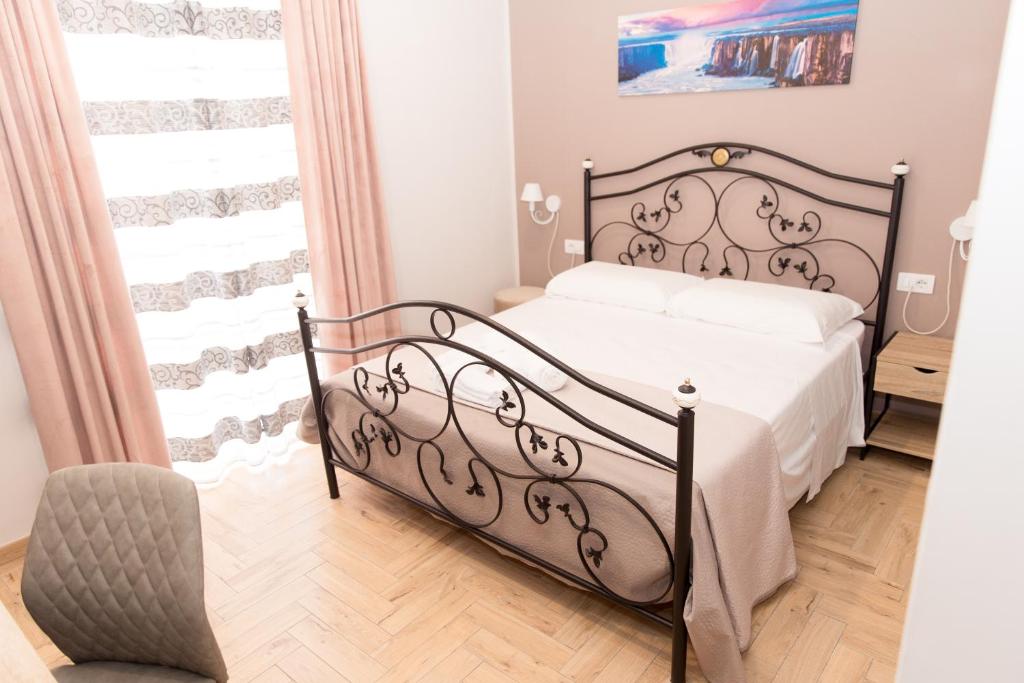 Una cama o camas en una habitación de B&B Civicocento