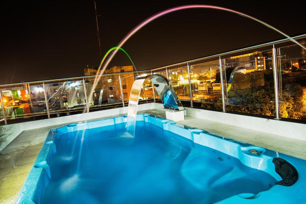 Swimmingpoolen hos eller tæt på Hotel la Ciudad