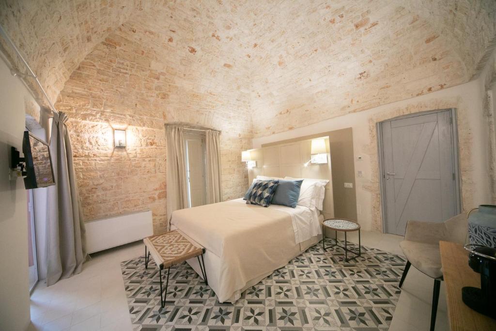 Posteľ alebo postele v izbe v ubytovaní San Marco Boutique Rooms