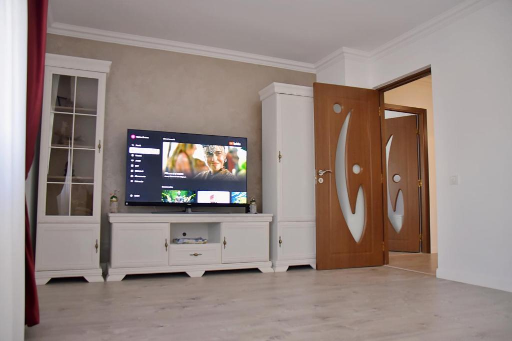 Apartament ILEV tesisinde bir televizyon ve/veya eğlence merkezi