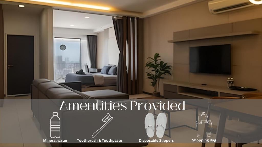 Μια τηλεόραση ή/και κέντρο ψυχαγωγίας στο Deluxe Seaview Suite King Bed by The Only Bnb