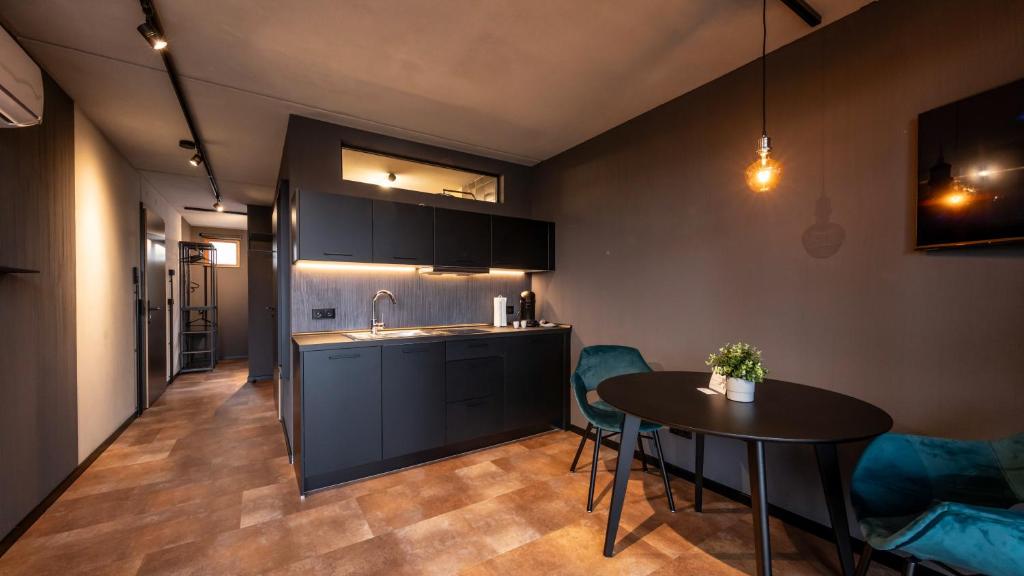 Una cocina o cocineta en Stadthaus Neckarsulm serviced apartments - Stadthaus Heiner