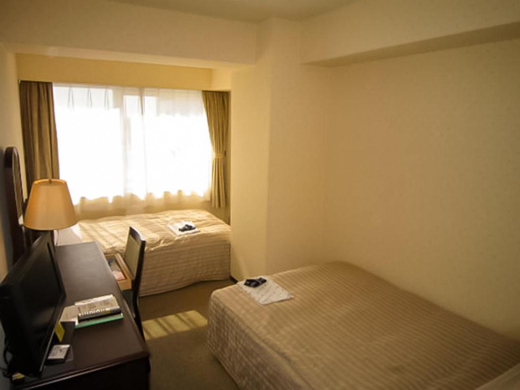 เตียงในห้องที่ Ichihara Marine Hotel - Vacation STAY 51072v