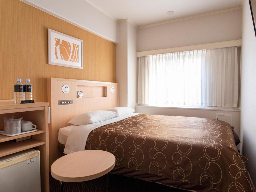 Krevet ili kreveti u jedinici u objektu Hotel New Hankyu Osaka