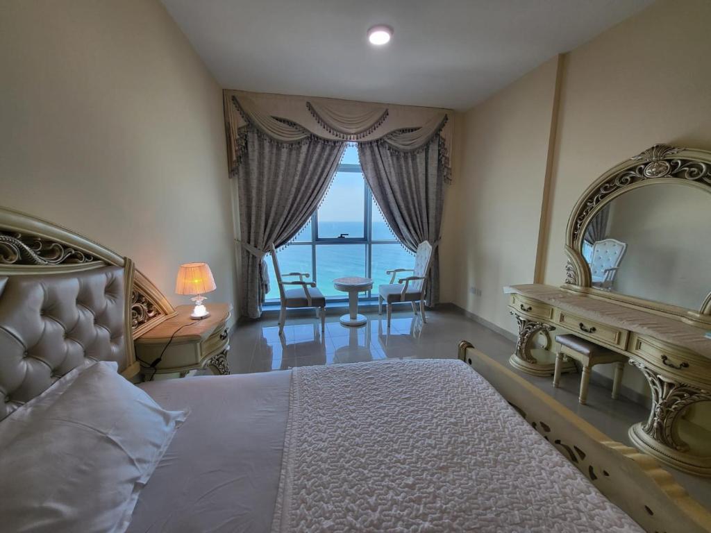 Katil atau katil-katil dalam bilik di Beachfront Holiday Homes