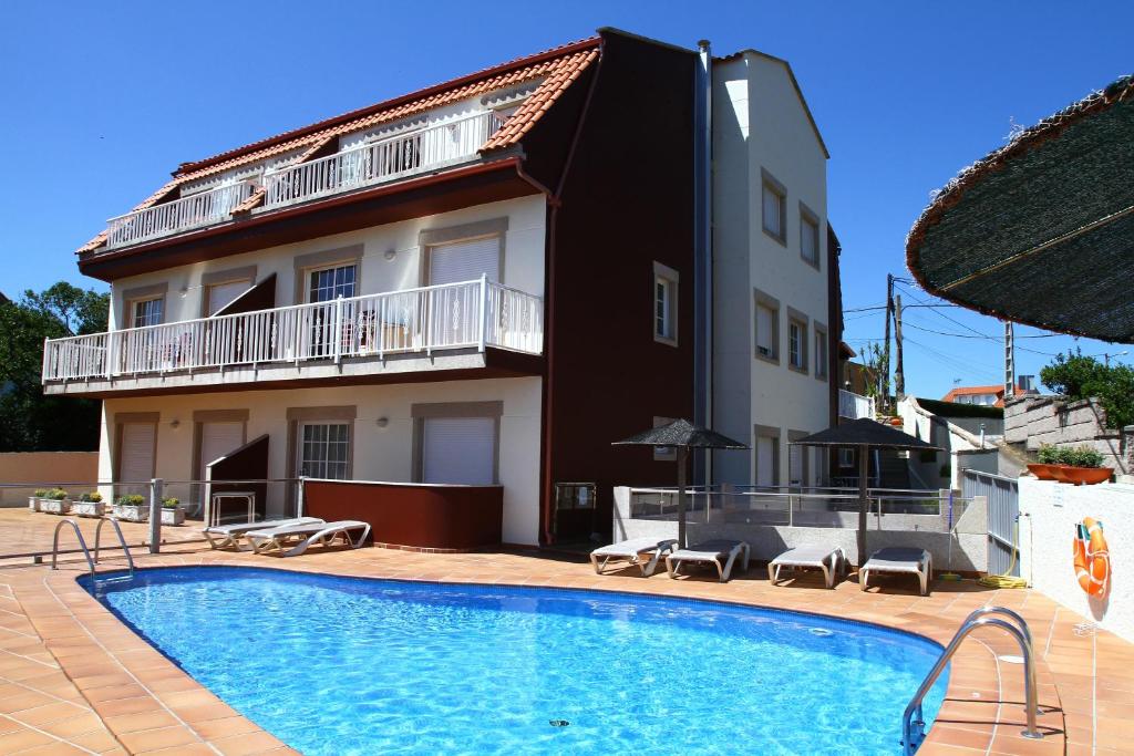 Swimmingpoolen hos eller tæt på Apartamentos Coral Do Mar I