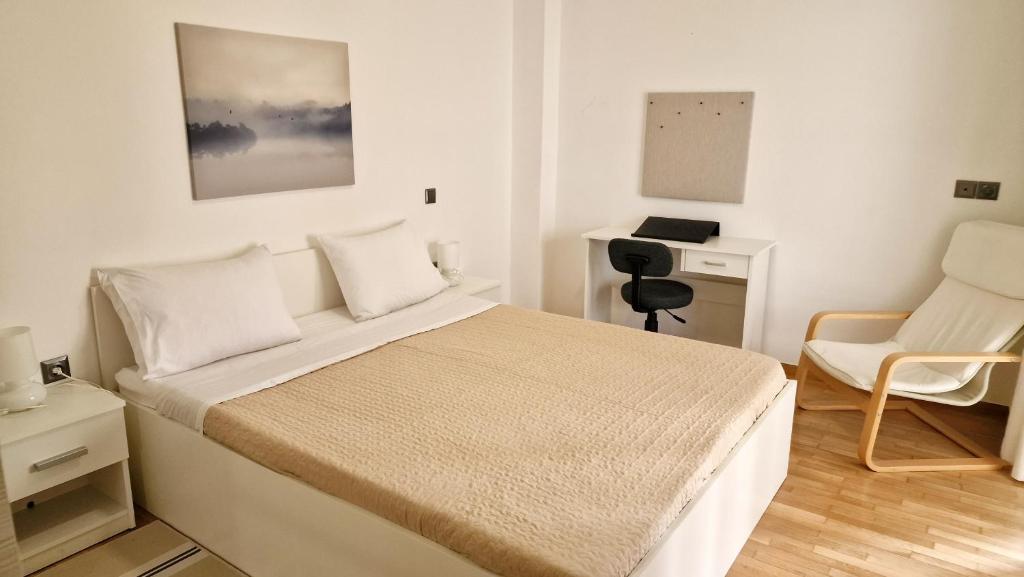 A bed or beds in a room at Apartment in the heart of Athens