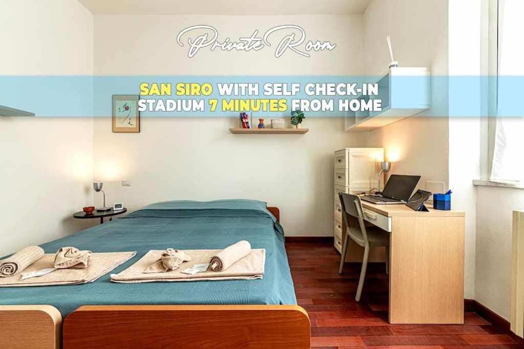 a bedroom with a bed and a desk with a laptop at SAN SIRO a 7 minuti Stanza Top con zone Comuni in Milan