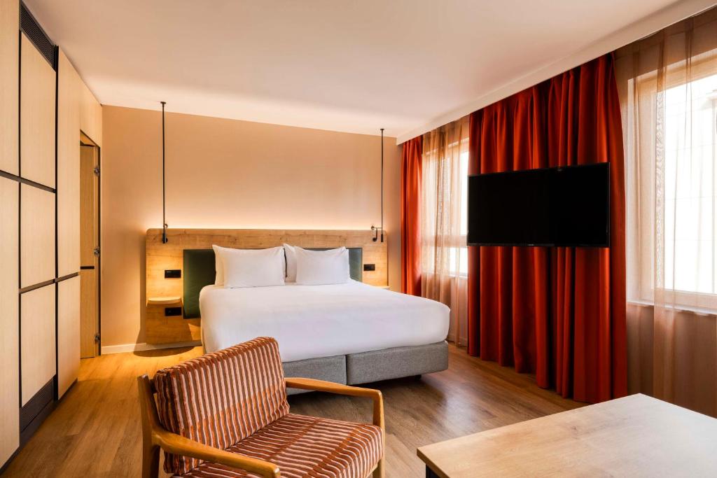 Ένα ή περισσότερα κρεβάτια σε δωμάτιο στο Hilton Garden Inn Brussels City Centre