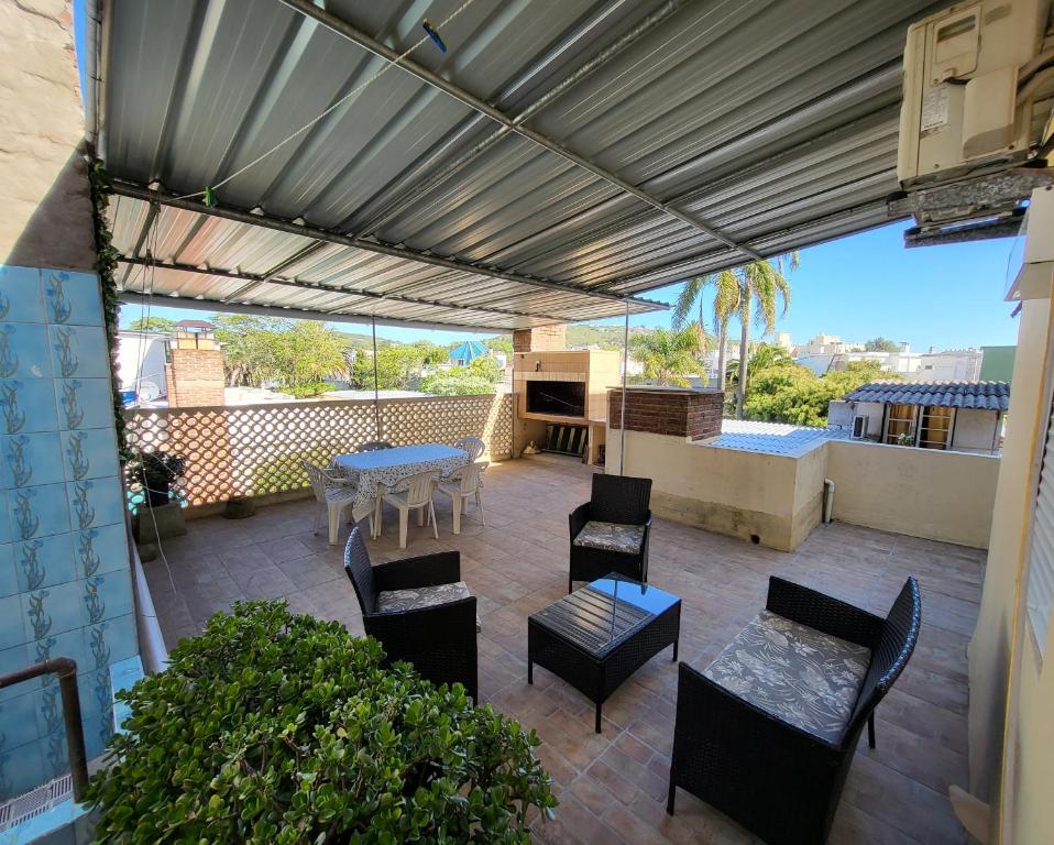 A balcony or terrace at Apartamento con Terraza y Parrillero