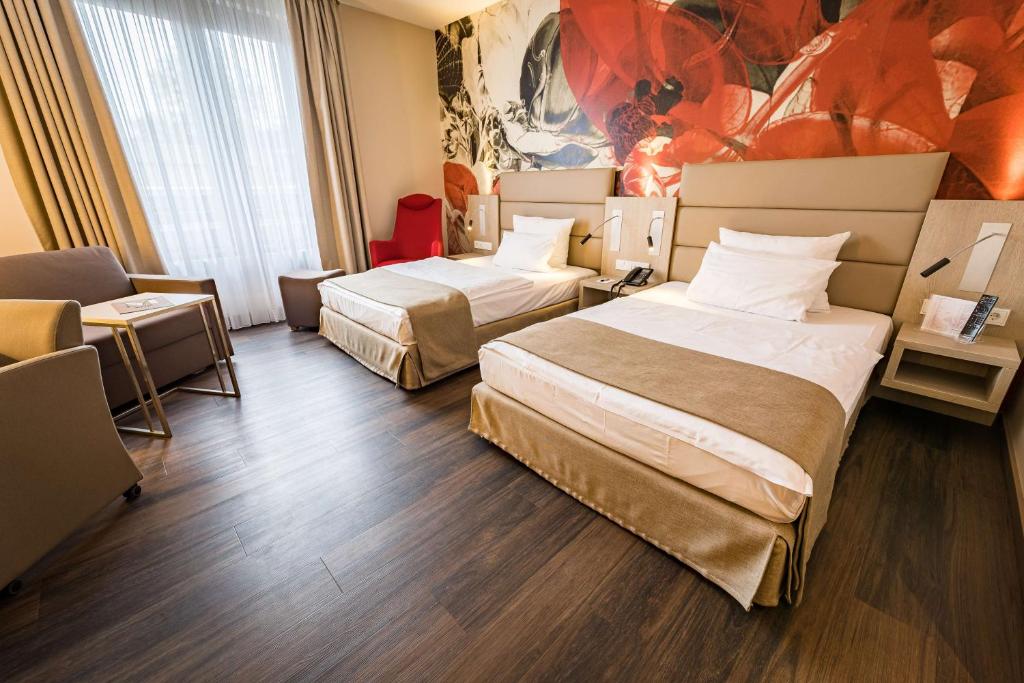 Gulta vai gultas numurā naktsmītnē First Inn Hotel Zwickau