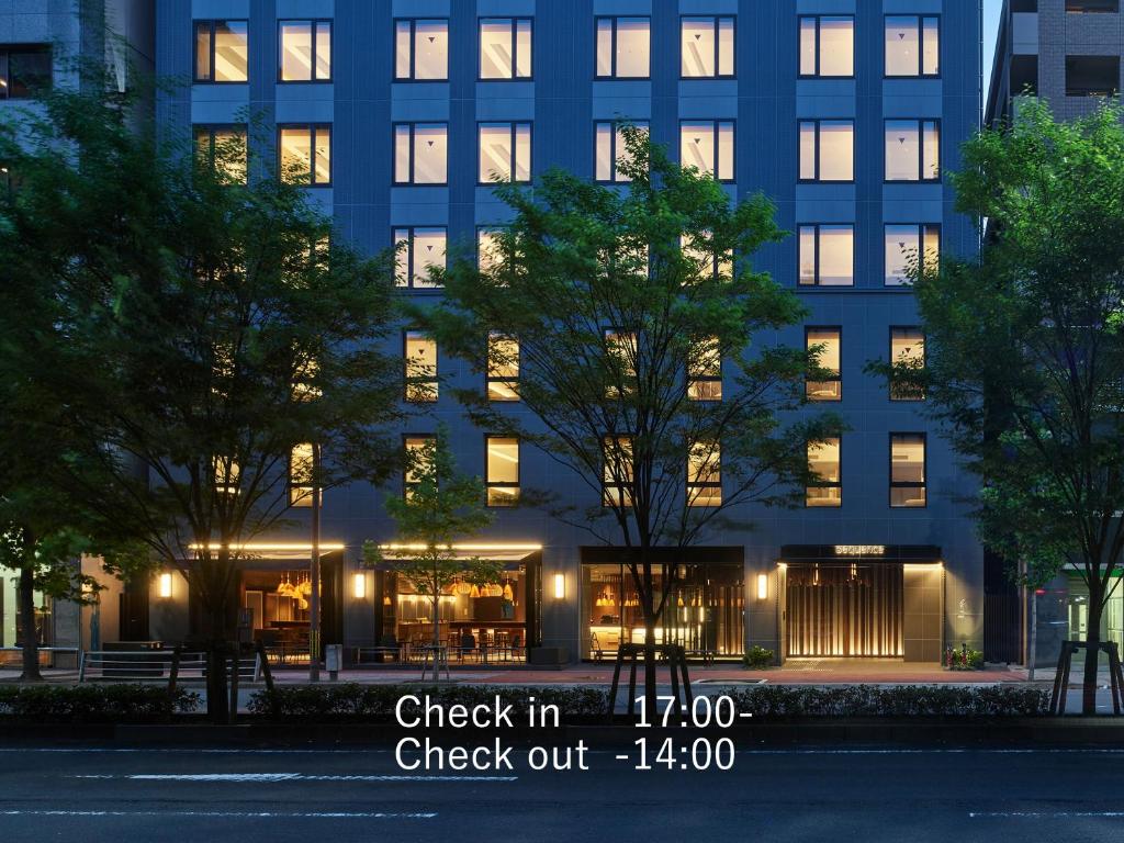 een gebouw met lichten ervoor bij sequence KYOTO GOJO in Kyoto