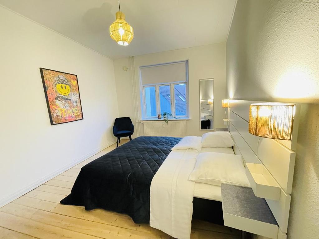 מיטה או מיטות בחדר ב-aday - Classy 2 bedrooms apartment in the center of Aalborg