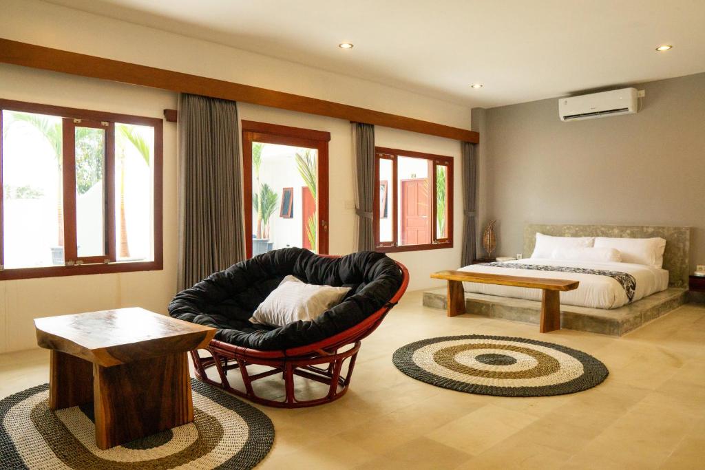 Predel za sedenje v nastanitvi Uluwatu Stay's Deluxe Suite #5