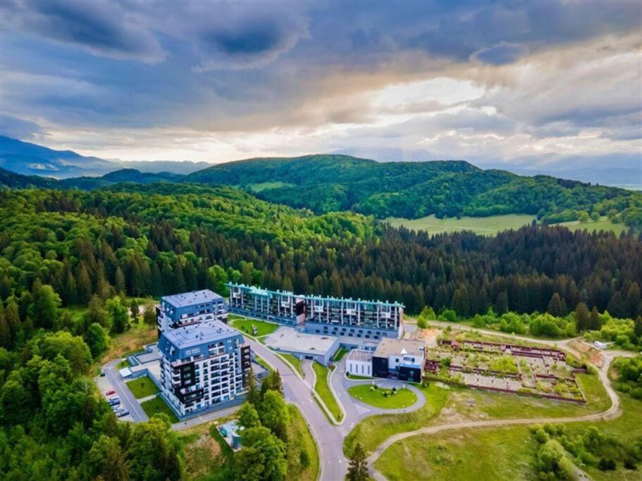 an aerial view of a building in the mountains at Silver Mountain, Poiana Brasov - Forest Crib in Braşov