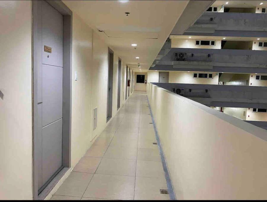 an empty hallway in an office building at SMDC Wind: T2 La Maison du Basa in Tagaytay