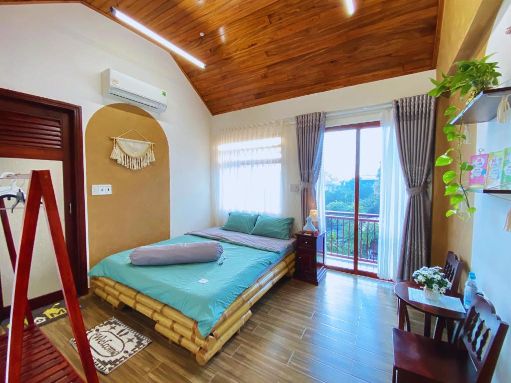 Ліжко або ліжка в номері Tâm Family Homestay-Huế