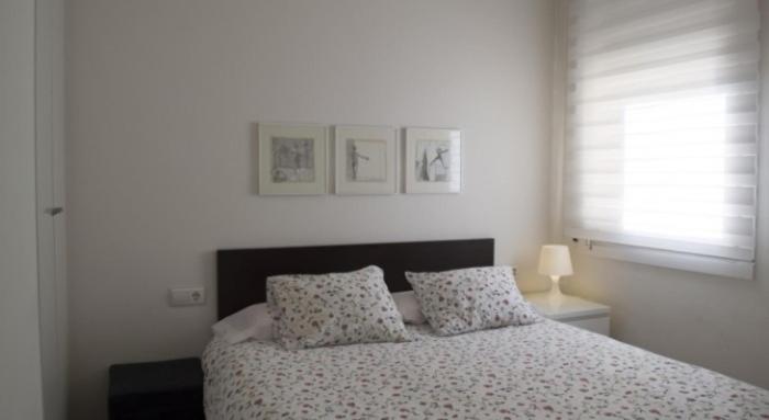 Lova arba lovos apgyvendinimo įstaigoje Apartament Conde Güell