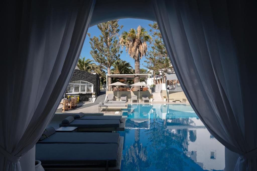 a view of the pool at a resort at Daedalus Hotel in Fira