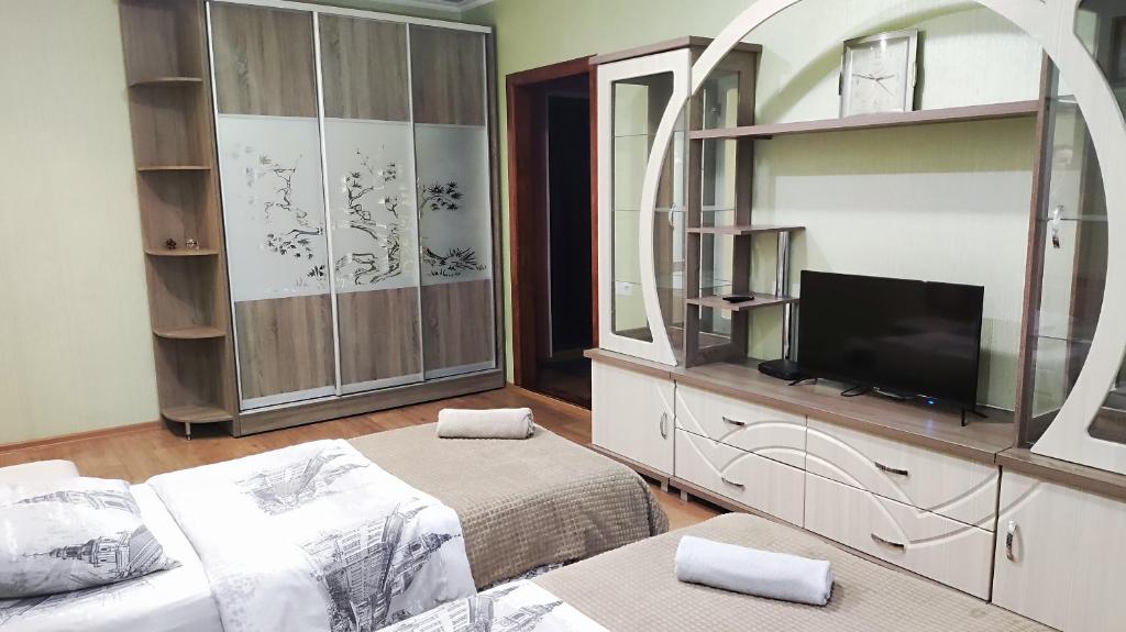 Cama ou camas em um quarto em Дачна 37,CityRooms