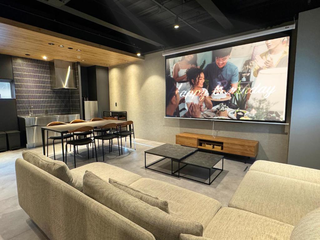 A television and/or entertainment centre at TABISAI HOTEL Lunon Tenjin