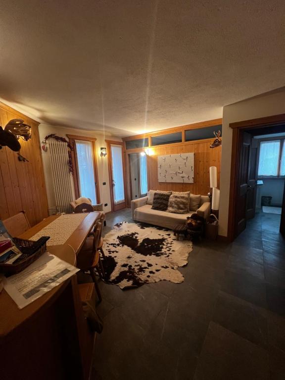 Rúm í herbergi á Appartamento incantevole con box e ski room, Wi-Fi, Bormio