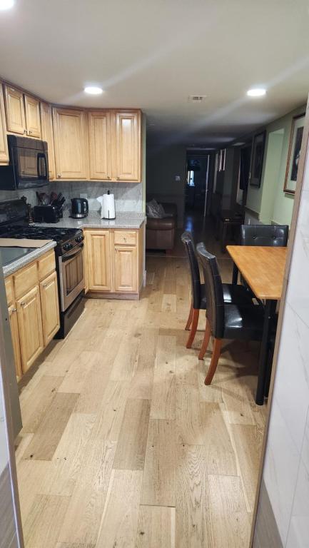 A kitchen or kitchenette at Two Bedroom Few Blocks From The Beach And Tropicana Casino