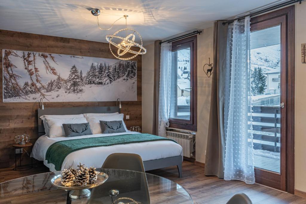 Легло или легла в стая в Diamante ampio monolocale stile chalet alpino