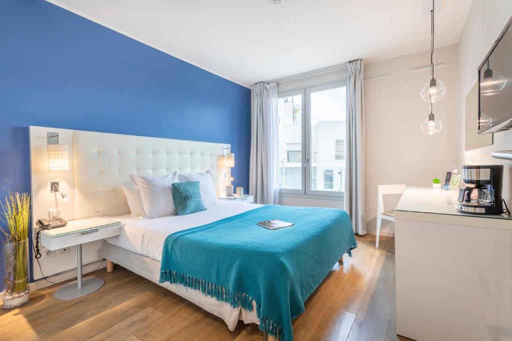 Zenitude Hôtel Résidences Marseille Saint-Charles房間的床