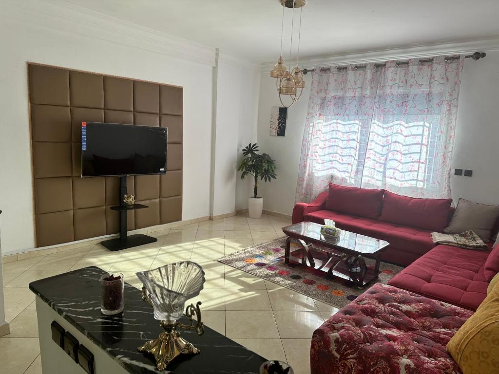 TV i/ili multimedijalni sistem u objektu Appartement à beni mellal