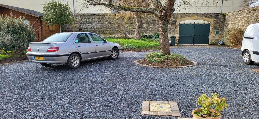 Kuvagallerian kuva majoituspaikasta 1 chambre 2 personnes dans une maison avec jardin proche centres d'intérêt et commerces, joka sijaitsee kohteessa Bayeux