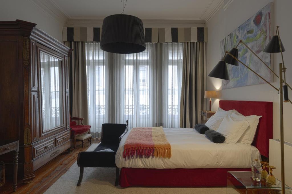 Cama ou camas em um quarto em Oporto Loft