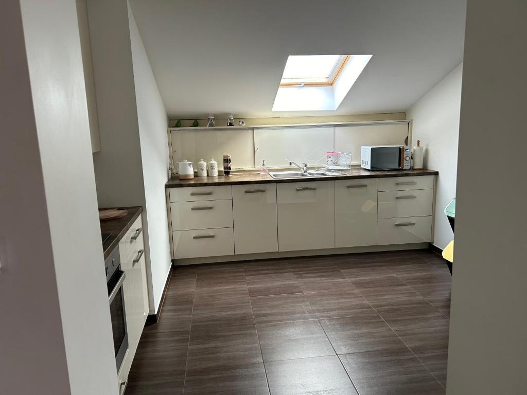 Dapur atau dapur kecil di Apartament Bobrzańska - 4 bedrooms sypialnie